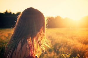 Little girl in field