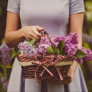 woman holding flower basket